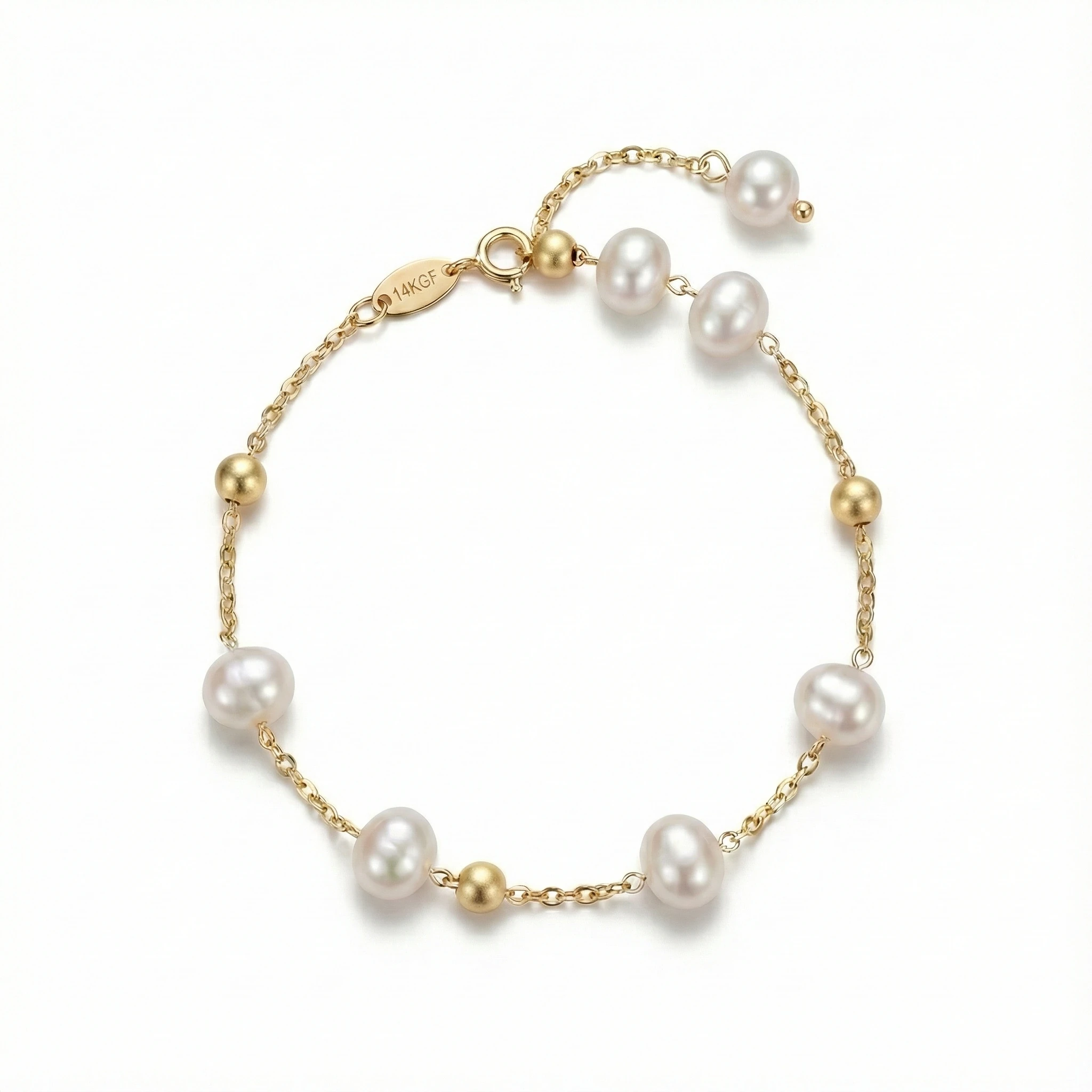 3 pulsera dorada con perlas blancas