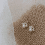 Pendientes de perlas en forma de huella de gato