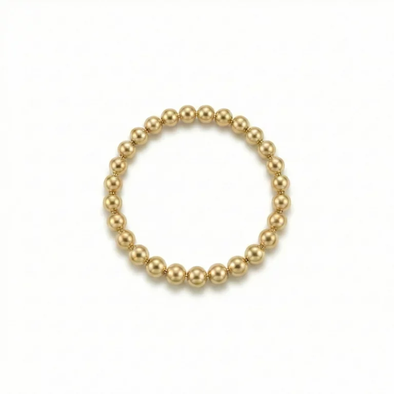 Anillo elástico de bolitas doradas en oro laminado