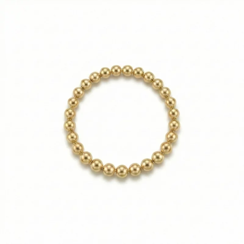 Anillo elástico de bolitas doradas en oro laminado