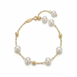 pulsera dorada con perlas blancas