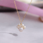 Collar con colgante de perlas naturales en forma dulce